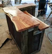 (2) pickets with the dog eared end cut off just enough to get to straight edge past the dog ear. Barnwood Bar With Live Edge Cedar Tops And Barn Tin Sides Diy Home Bar Wood Bar Top Rustic Basement