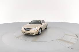 Image result for Bright Silver 2010 Sebring