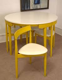 All Tucked In Hans Olsen S Super Space Saving Dining Set Space Saving Dining Table Furniture Dinette Sets
