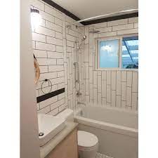If i were to tile the back wall of a shower or bathtub surround with subway tile i would generally start with a vertical centerline. Soho White 4x16 Matte