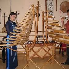 Traditional Vietnamese Instruments By Machka Instruments Traditional Folk Musician