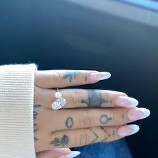 Taking to instagram, the pregnant model, 29, who is expecting her first child with the. The Sweet Detail Everyone Missed In Ariana Grande S Engagement Ring British Vogue