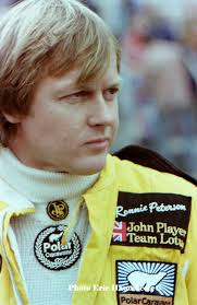 Who is the driver in the photo of the US Grand Prix West JPS MkIII Lotus 78?