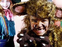 Students get dressed for story time and Education Week