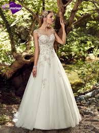 Conseil et inspiration avec plus de 2000 robes de mariée. Robe De Mariee Mirat Robe De Mariee Broderie Couleurs Point Mariage Wedding Dresses Sleeveless Wedding Dress Bride