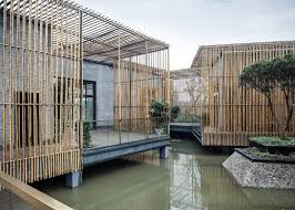 This Floating Tea House In Yangzhou By Chinese Architects Hwcd Associates Features Brick Rooms L Floating Architecture Water Architecture Bamboo Architecture