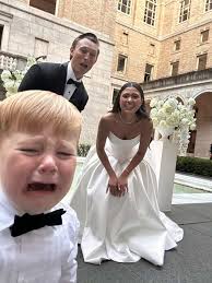 This little guy was done being the ring-bearer at his uncle's wedding at  the Boston Public Library this past weekend... 🤍 📷: @ajshaughnessy  @dpopss 👪: @haleycarney_ @briancarney2