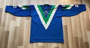A visual transition, from green to blue, from one era of #canucks hockey to the next. Canucks Reverse Retro Jersey Which Throwback Will They Wear Vancouver Is Awesome