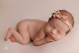 Oh y'all, these babies that I am meeting are absolutely amazing. This big  brother was so excited to hold this baby sister. He didn't want to let her  go, it was the