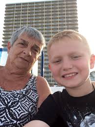 120-year-old woman shares her homemade birthday cake with peach cream and  filling