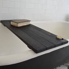 Enjoying a relaxing soak in the bathtub is something most of us take for granted, however, for people who have certain disabilities, mobility problems or elderly, getting in and out of a standard bath can be difficult. Black Bathtub Tray Bath Caddy Bath Tray Bathroom Storage Etsy Wood Bathtub Wood Tub Tub Caddy
