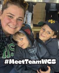 Proud parents of senior daughter attending college