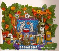 Pan de muerto is plain round sweet bread sprinkled with white sugar and crisscrossed bone shape laid on top. How To Build A Dia De Los Muertos Altar Photos 89 3 Kpcc