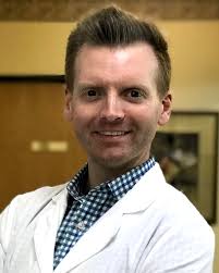 Dr. Adam Spriggs