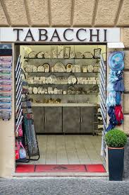 Tobacco Shop Door With Posters Hanging On The Sides And Souvenirs Hanging Posters Shop Doors Tobacco Shop