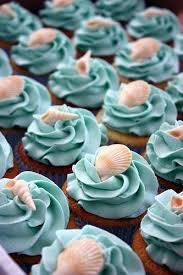 How to make beach party cupcakes. Perfect Seashell Topped Cupcakes Fabulous For A Beach Wedding Or Beach Theme Bridal Shower Beach Theme Bridal Shower Beach Theme Cupcakes Beach Bridal Showers