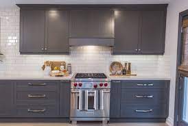 The kitchen now ties in better with the adjoining laundry room. How To Refinish Kitchen Cabinets Bryan Baeumler Breaks It Down