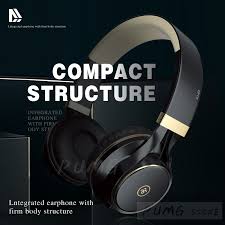 Emotional young man in earphones using laptop while sitting at table in kitchen. Hifi Gaming Headset Ep16s 3 5mm Wired Foldable Stereo Headphone Over Ear Big Earphone For Phone Boy Gift Music Headset Headphone Upgrade Your Pc Gaming Discounts On Graphics Audio Processing Monitors