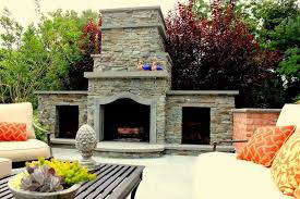 The bookcase mantel includes adjustable shelves. 12 Ft Wood Burning Stacked Bluestone Fireplace With Bluestone Accents