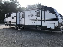 It packs all of your gears, essentials and let you enjoy with your family or friends. 2021 Grand Design Imagine 3250bh Rear Bunkhouse Outside Kitchen Travel Trailer