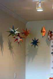 Practical Family Living For Book Loving Parents Hanging Stars Decorations Christmas Hanging Decorations Christmas Ceiling Decorations Hanging Origami