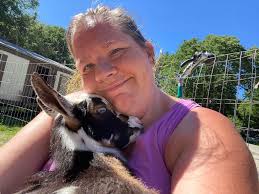 Should goats have their own barn or can they share with other animals like  pigs, rabbits, and chickens?