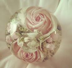 Use tweezers to place the dried flower in the resin. How Amazing Preserving Your Wedding Bouquet In Resin Forever Resin Flowers Diy Wedding Bouquet Wedding Bouquet Preservation