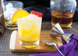 This Amaretto Stone Sour Cocktail Has A Bright Citrus Punch From Sour Soda And A Fresh Splash Of Orange Jui Sour Cocktail Amaretto Stone Sour Recipe Stone Sour