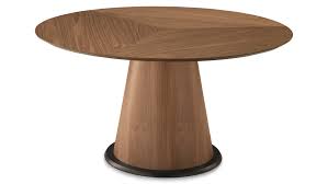 A round dining table from crate and barrel is a beautiful addition to your space. Bricco Walnut Dining Table