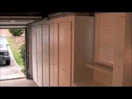 A hoist is a great way to create garage storage overhead or for garage bike storage. Building Rather Than Buying Garage Storage Cabinets Youtube