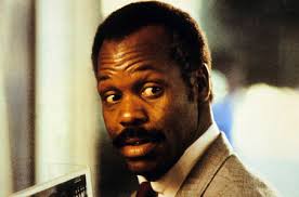 Image of Frank Raines listens to President-Clinton during a press  conference held