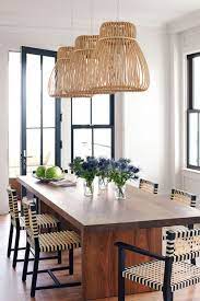 Crafted from metal in a versatile solid finish, this light fixture features a rectangular canopy and three adjustable hanging cords that hold a trio of spherical glass shades with openings along the bottom. 15 Dining Room Lighting Fixtures Stylish Ideas For Dining Room Lights
