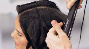 Place the flicks between the rods of the straightener. Watch Hey Hair Genius How To Curl Short Hair With A Straightener Glamour Video Cne Glamour Com Glamour
