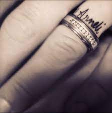 My Love He Can T Wear His Wedding Band At Work For Safety Reasons So He Surprised Me And Got My Name And Ring Tattoo Designs Wedding Date Tattoos Wife Tattoo