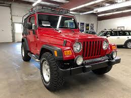 Image result for Flame Red 2005 Jeep