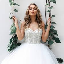 Lace sleeves wedding dress size 22 used designer white rose graceful chiffon. Madison Rose Bridal Madison Rose Bridal