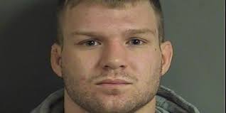 Police: UI wrestler took SUV without permission