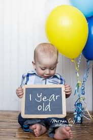 Birthday Theme For 1 Year Old Baby Boy One Year Old Boy Holding Chalk Board For First Birthday Photos Baby Boy First Birthday First Birthday Photos Birthday Photos