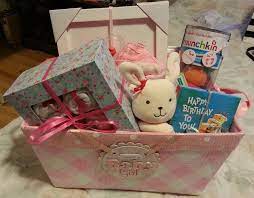 Diy Baby Girl Gift Basket Pop Up Book Stuffed Animal I Love Mommy Pacifiers Clothing Shoes Toy Scrapbook Gift Diy Baby Shower Gifts Girl Gift Baskets