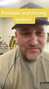 Portable oral rinsing system...