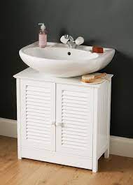 Pedestal sinks are a popular choice in many bathrooms. Bathroom Storage Under Pedestal Sink Pedestal Sink Storage Under Sink Bathroom Small Bathroom Storage
