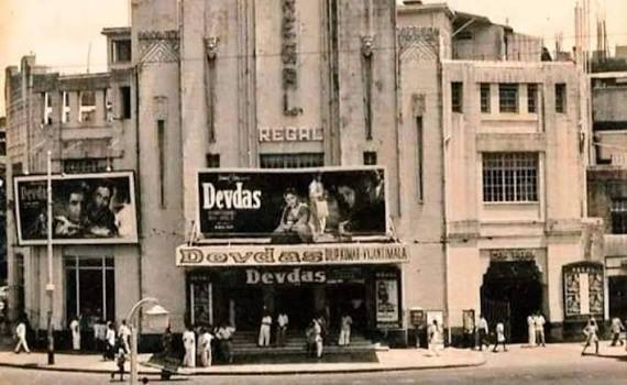 When Regal Cinema first opened its Art Deco doors in 1933, it was Bombay's very first air-conditioned theatre — all velvet seats and cinematic grandeur. Image 1: Back then, Colaba's streets were