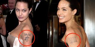 The one on his right wrist. Celebrity Tattoo Cover Ups