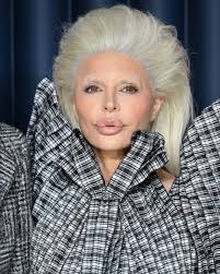 Former reality tv actress #LisaRinna attempts to garner attention as she  dresses as #KarlLagerfeld in drag during a recent appearance. She looks  crazy asf.