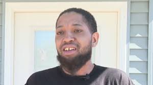 Dad joins rent-free tiny home community with family of 4