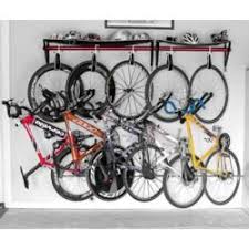 I Love How The Bikes Turn To Lay More Flat Against The Walls And The Utility Rack On Top 239 Though Garage Organization Bikes Bicycle Storage Bike Storage