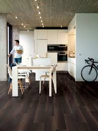 Quickstep Perspective Wide Fumed Oak Dark Planks 2v Groove Laminate Flooring 9 5 Mm Laminate Flooring In Kitchen Dark Laminate Floors Kitchen Flooring