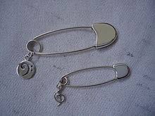She started to silversmith in 1974, making earrings, rings, and 'slave bracelets'. Safety Pin Wikipedia