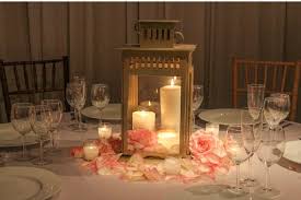 Lantern Centerpiece And Rose Petals Non Floral Centerpieces Lantern Centerpieces Wedding Table Centerpieces
