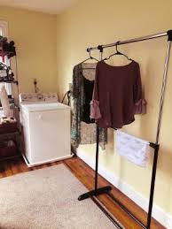 Free shipping for many products! Mainstays Adjustable 2 Tier Rolling Garment Rack Adjustable Design Walmart Com Walmart Com